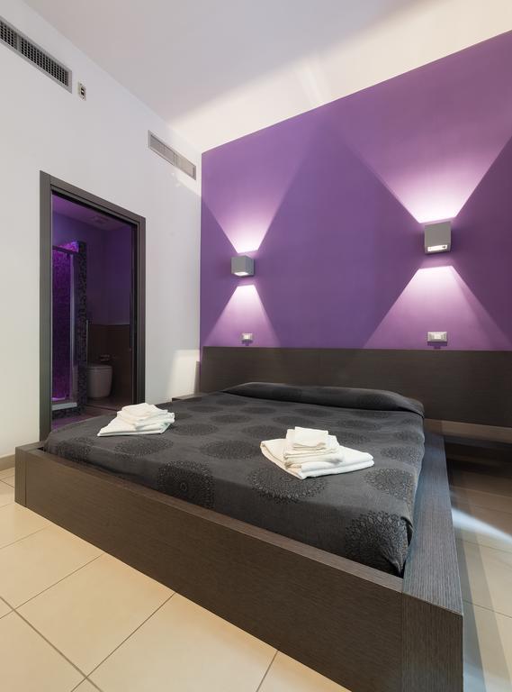Chroma Suites Habitación foto